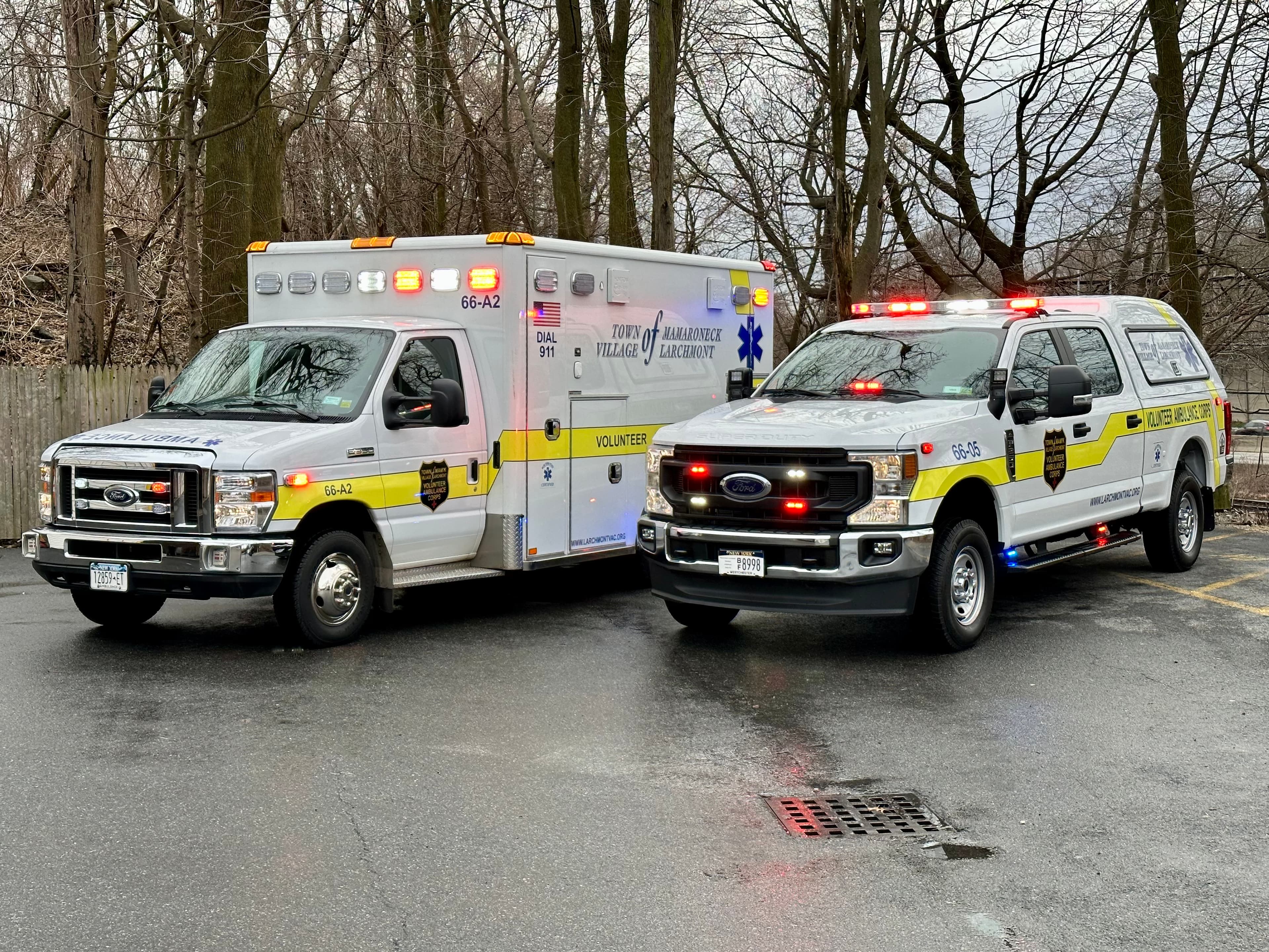 Two Larchmont VAC vehicles parked together