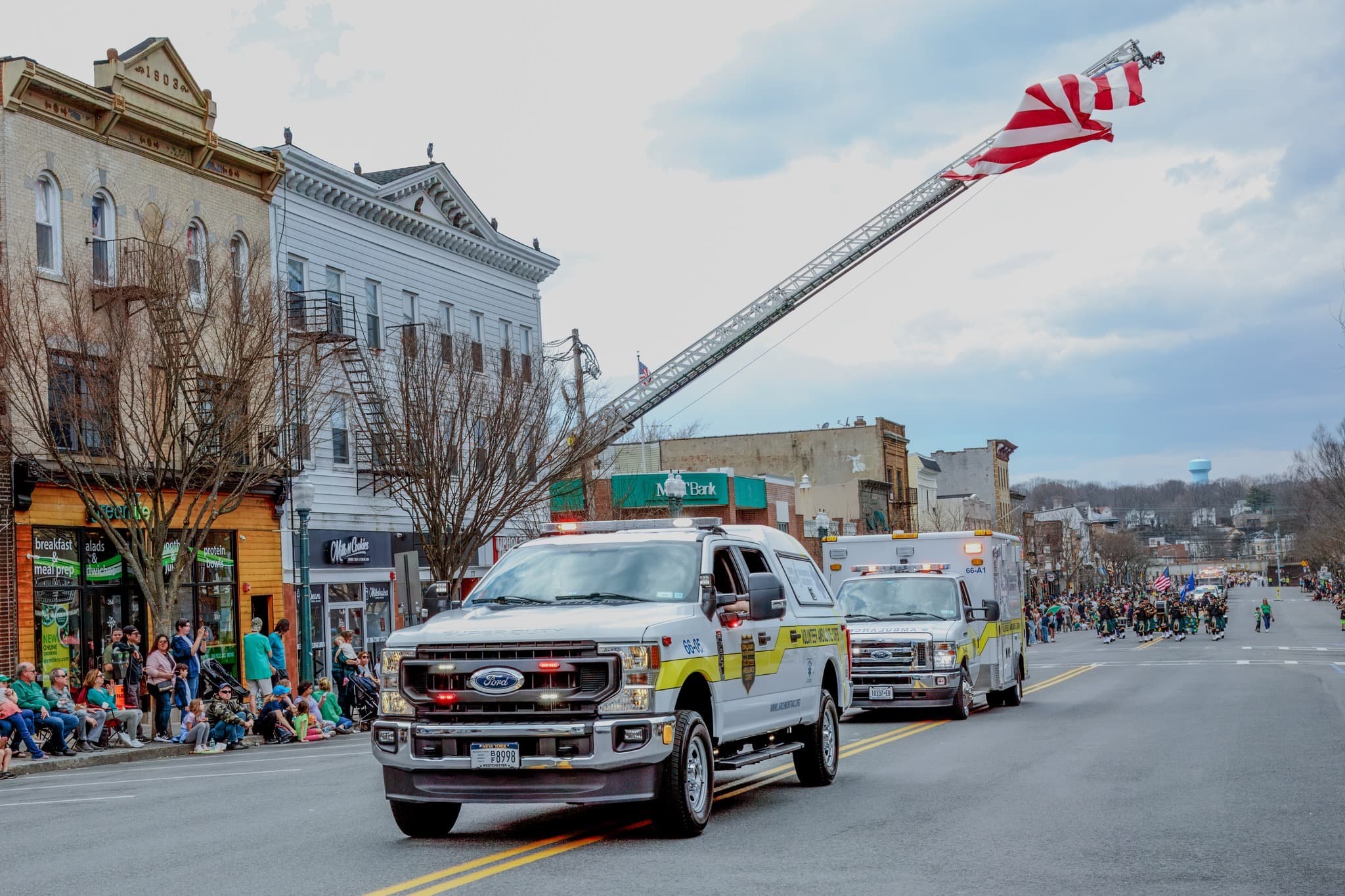 Larchmont VAC truck driving in a local parade